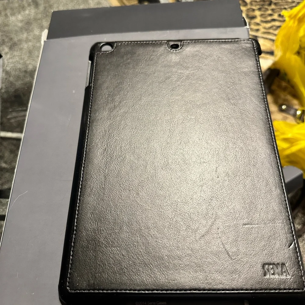 Black leather Ipad air case. Fits Ipad air and 9.7” Ipad. Brand new in the box.